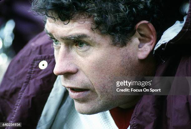 Running back John Riggins of the Washington Redskins looks on from the bench during an NFL football game circa 1981. Riggins played for the Redskins...