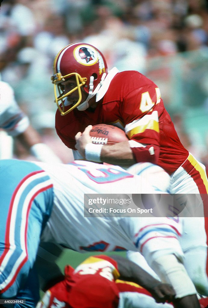 44 Redskins John Riggins Running back John Riggins of the Washington Redskins carries the ball ...