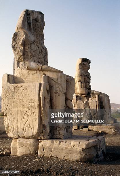 Statues of Amenhotep III, known as Colossi of Memnon, Ancient Thebes , Egypt. Egyptian civilisation, New Kingdom, Dynasty XVIII.