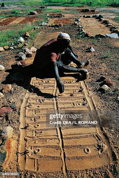 Divination table, performed by a Hogon, spiritual guide of the Dogon people, Mali.