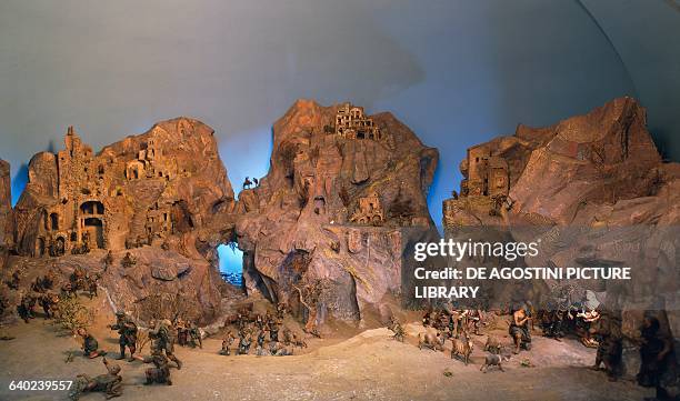 Carved and painted wooden Nativity scene with paper mache applications, Monaco. Germany, 19th century. Monaco, Bayerisches Nationalmuseum