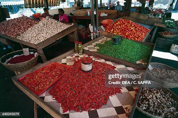 Selling spices at the market in Saint Denis, Reunion, Mascarene Islands, French overseas department.