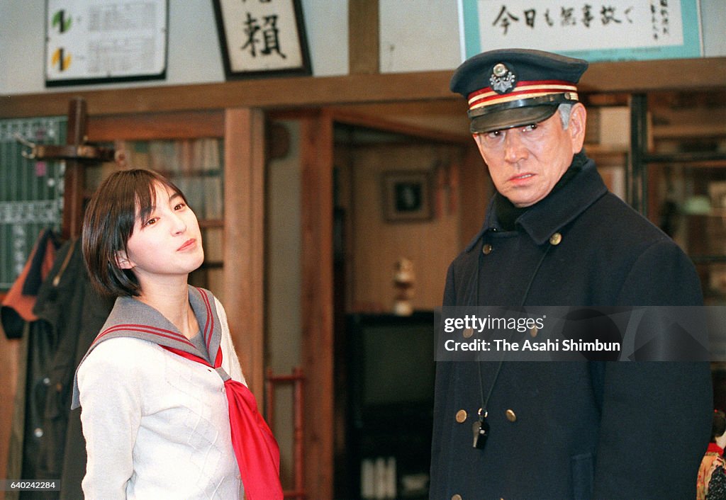 Poppoya Rapper Actor Ken Takakura and actress Ryoko Hirosuke are seen filing movie ...
