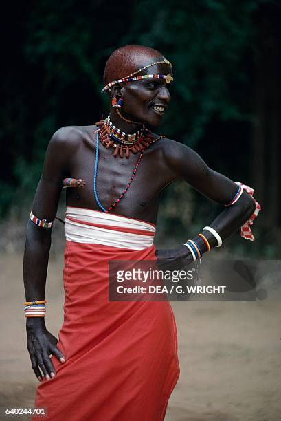Young Samburu man wearing typical ornaments, Samburu National Reserve, Kenya.