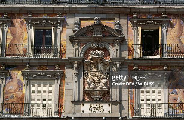 Facade of the Bakery House , 1619-1670, with the coat of arms of Charles II of Spain, Main Plaza , Madrid, Spain.