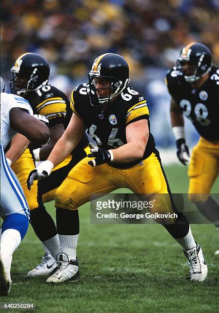 Offensive lineman Alan Faneca of the Pittsburgh Steelers blocks during a game against the Detroit Lions at Heinz Field on December 23, 2001 in...