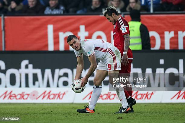 Kyriakos Papadopoulos of Hamburger and Dario Lezcano of Ingolstadt looks on during the Bundesliga match between FC Ingolstadt 04 and Hamburger SV at...