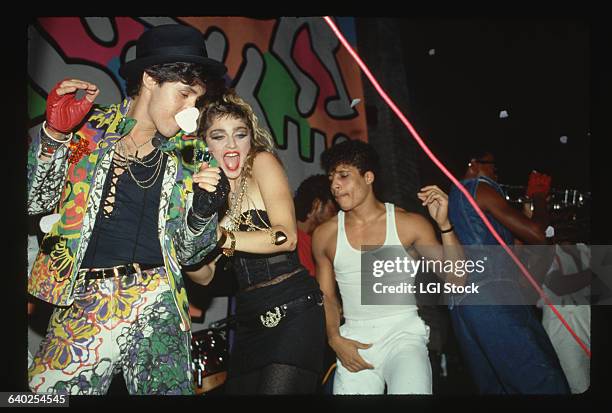 Singer Madonna dances at a wrap party at the Palladium, New York City.