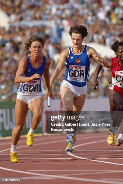 Marlies Gohr from East Germany takes the baton during the final race in the Women's relay at the World Championships.