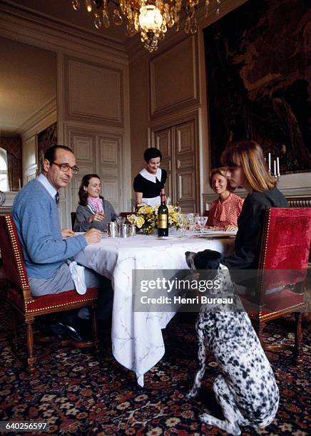 Jacques Chirac with his wife Bernadette, and their two daughters Laurence and Claude , having lunch in their Paris City Hall apartment, served by...