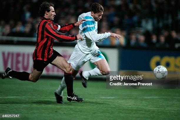 Franco Baresi and Chris Waddle during a friendly match between AC Milan and Olympique Marseille .