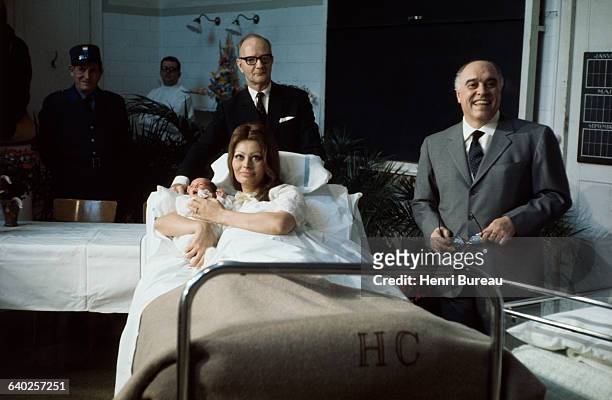 Italian actress Sophia Loren and her husband, Italian producer Carlo Ponti in the hospital for the birth of Loren's first child, Carlo Ponti, Jr.