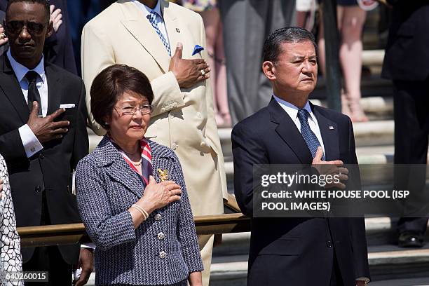 Veterans Affairs Secretary Eric Shinseki and his wife Patricia Shinseki look on during as President Barack Obama attends a wreath laying ceremony at...