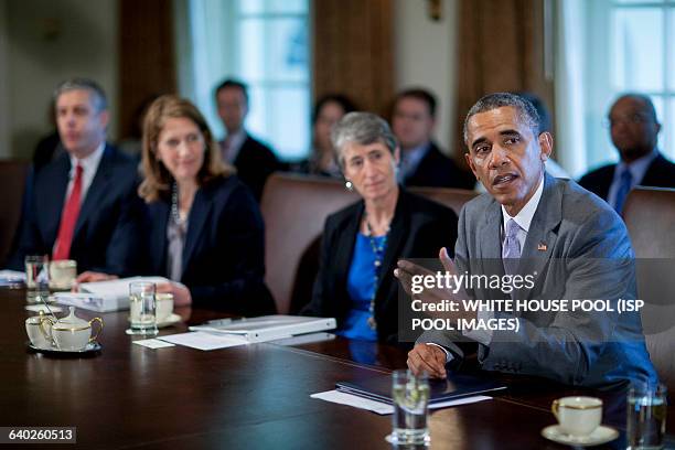 President Barack Obama, right, speaks during a cabinet meeting at the White House with Arne Duncan, U.S. Education secretary, from left, Sylvia...