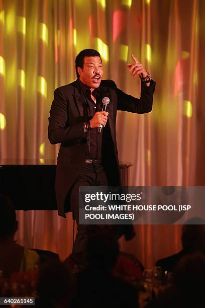 American singer Lionel Richie performes 'Easy' during a dinner on the occassion of the U.S.-Africa Leaders Summit on the South Lawn of the White...