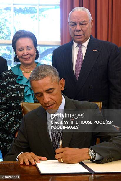 President Barack Obama, with America's Promise Alliance Founding Chairman and former US Secretary of State General Colin Powell and current Board...