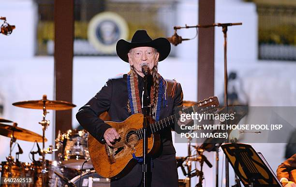 Singer Willie Nelson performs at "A Salute to the Troops: In Performance at the White House" concert on the South Lawn November 6, 2014 in...