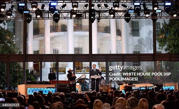 President Barack Obama speaks at "A Salute to the Troops: In Performance at the White House" on the South Lawn November 6, 2014 in Washington, DC....