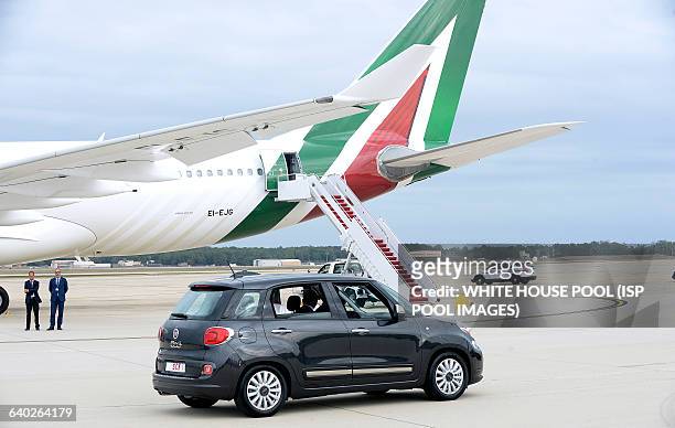 His Holiness Pope Francis is being transported to Washington D.C in a Fiat 500 at Joint Base Andrews in Maryland on September 22, 2015. The Pope is...
