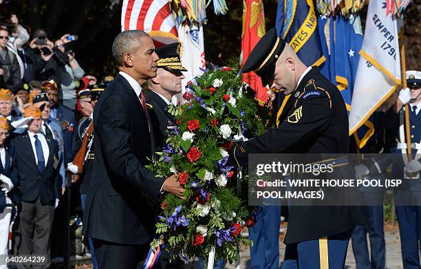 President Barack Obama lays a wreath at the Tomb of the Unknown Soldier at Arlington National Cemetery, November 11 , 2015 in Arlington, Virginia....