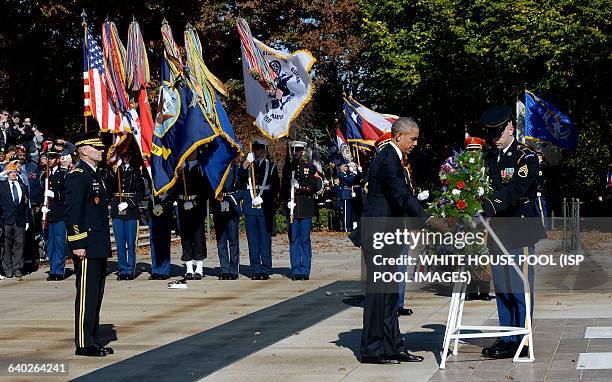 President Barack Obama lays a wreath at the Tomb of the Unknown Soldier at Arlington National Cemetery, November 11 , 2015 in Arlington, Virginia....