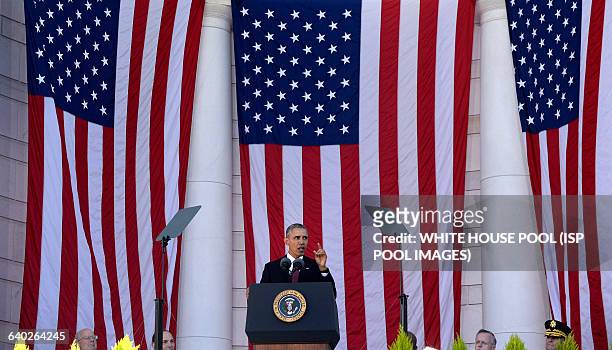 President Barack Obama speaks at Arlington National Cemetery, November 11 , 2015 in Arlington, Virginia. President Barack Obama visits Arlington...
