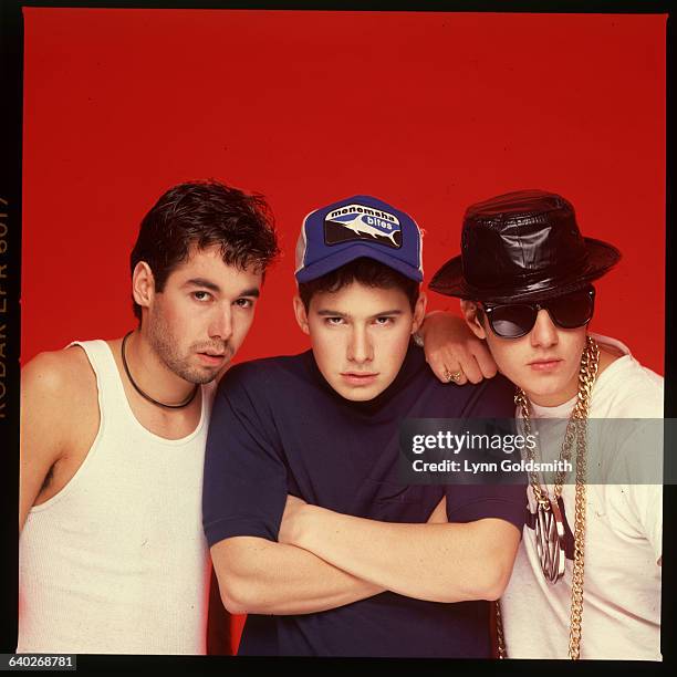 Beastie Boys shown posed in a studio. Undated.