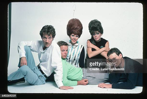 The members of the rock/new wave group the B-52s in a studio portrait. From left to right: Fred Schneider, vocals; Ricky Wilson, guitar; Kate...