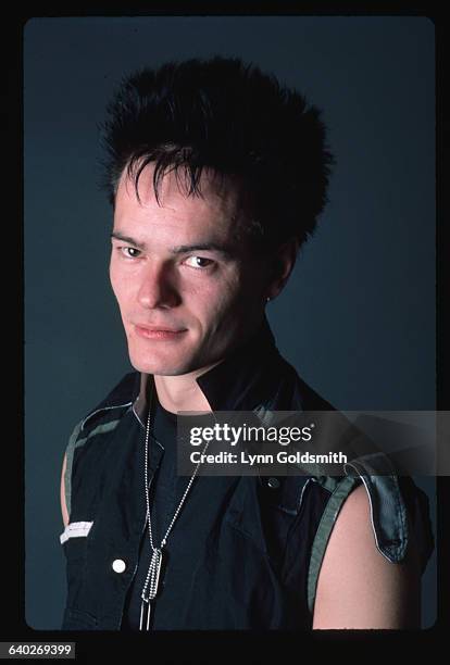Studio headshot of Clash guitarist Vince White. Photograph, 1984.