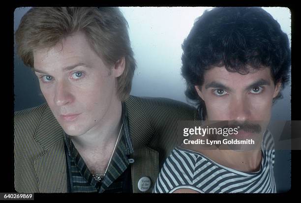 Daryl Hall , singer, and John Oates, guitarist, of the pop group Hall and Oates.