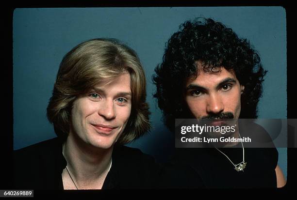 Daryl Hall , singer, and John Oates, guitarist, of the pop group Hall and Oates.