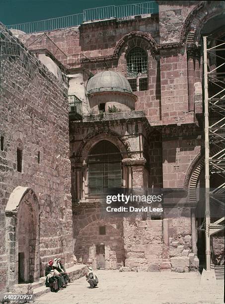 The entrance to the Church of the Holy Sepulchre in Jerusalem. The original site of the Church is disputed; the New Testament describes the site as...