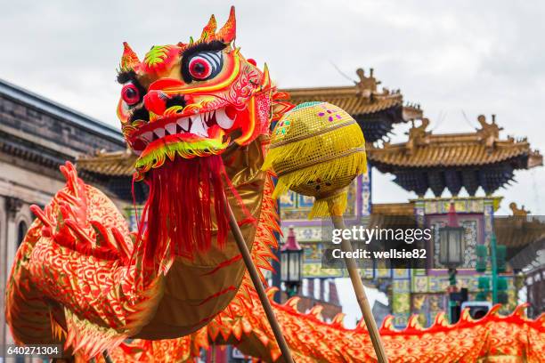 dragon dance in chinatown - kung hei fat choi stock pictures, royalty-free photos & images