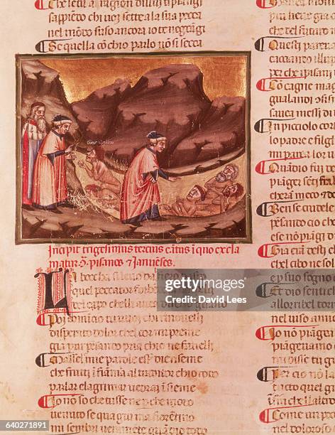 Dante gazes into a pit containing sinners lying on their backs. One has a badly gashed head, another leans forward to speak to the poet.