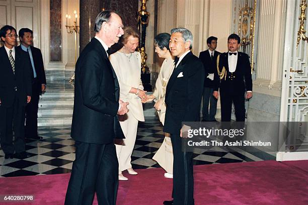 Grand Duke Jean and Grand Duchess Josephine Charlotte of Luxembourg welcome Emperor Akihito and Empress Michiko prior to a return reception at the...