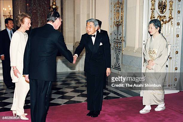 Grand Duke Jean and Grand Duchess Josephine Charlotte of Luxembourg welcome Emperor Akihito and Empress Michiko prior to a return reception at the...