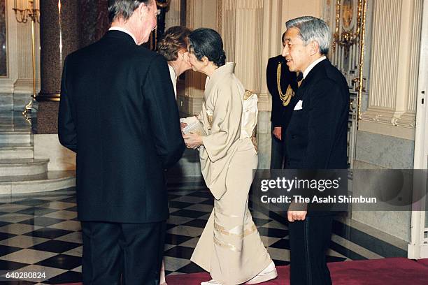 Grand Duke Jean and Grand Duchess Josephine Charlotte of Luxembourg welcome Emperor Akihito and Empress Michiko prior to a return reception at the...