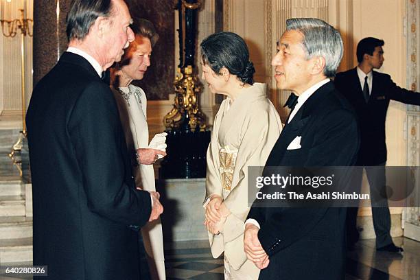 Grand Duke Jean and Grand Duchess Josephine Charlotte of Luxembourg welcome Emperor Akihito and Empress Michiko prior to a return reception at the...