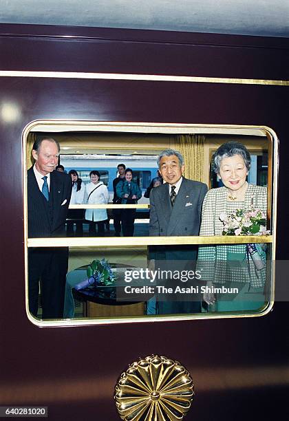 Grand Duke Jean of Luxembourg, Emperor Akihito and Empress Michiko are seen at the special coach at JR Otsuki Station on April 8, 1999 in Otsuki,...