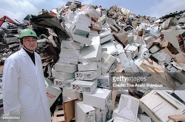 Used computers are piled up at a factory on April 26, 1999 in Kazo, Saitama, Japan.