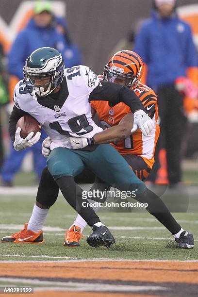 Paul Turner of the Philadelphia Eagles runs the football upfield against Darqueze Dennard of the Cincinnati Bengals during their game at Paul Brown...