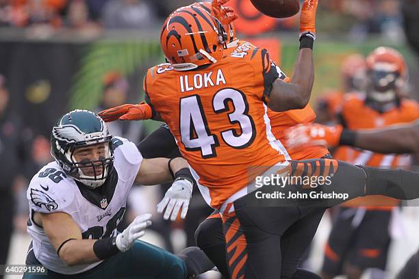 George Iloka of the Cincinnati Bengals makes the interception in front of Zach Ertz of the Philadelphia Eagles during their game at Paul Brown...
