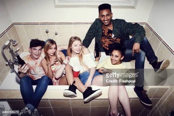group of friends having fun at a party - clean up after party stock pictures, royalty-free photos & images