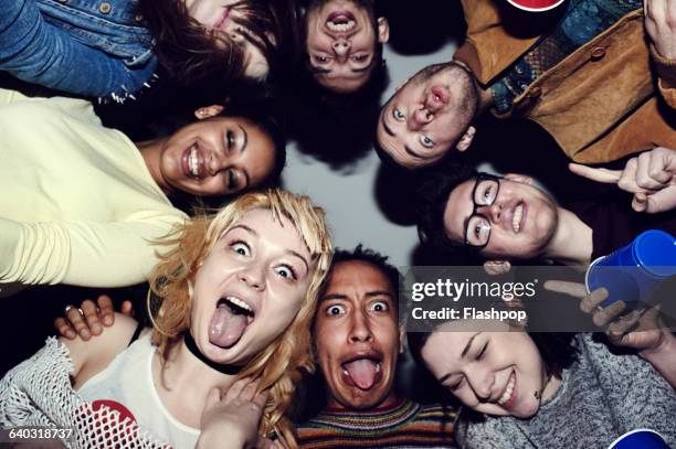 group of friends having fun at a party - group of young people having a party fotografías e imágenes de stock