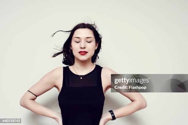 portrait of a carefree young woman - newnaivetytrend stock-fotos und bilder