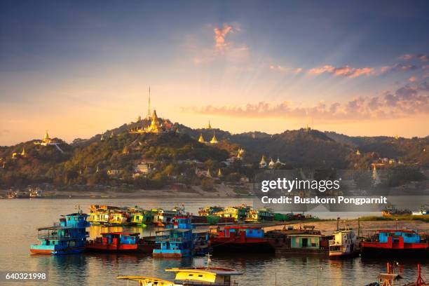 cargo boats on the irrawaddy river in mandalay - myanmar stock-fotos und bilder