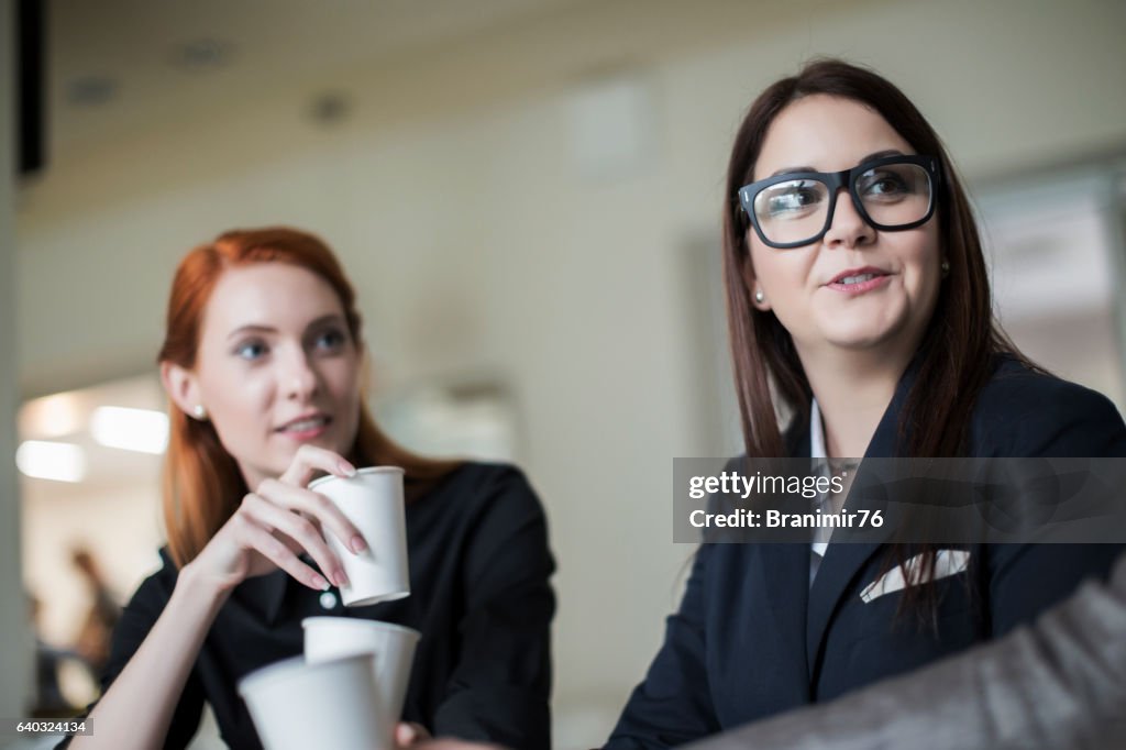 Bussines people drinking a coffee on meeting