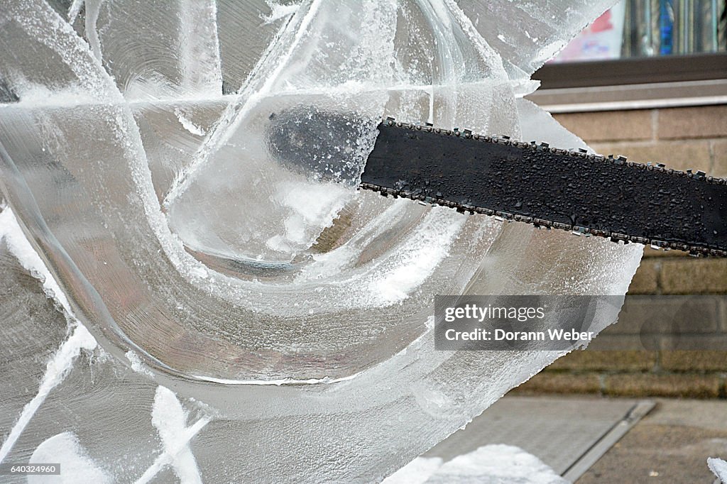 Making a ice sculpture with chainsaw