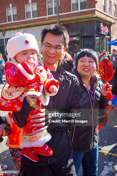 family at chinese new year - three year stock pictures, royalty-free photos & images