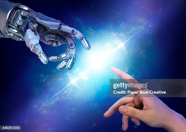 robot hand close to touching a human hand - bionic hand stock-fotos und bilder